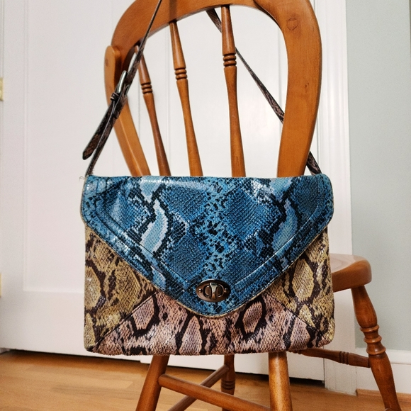 Carlos Santana Handbags - EUC Handbag Blue/Tan Animal Print